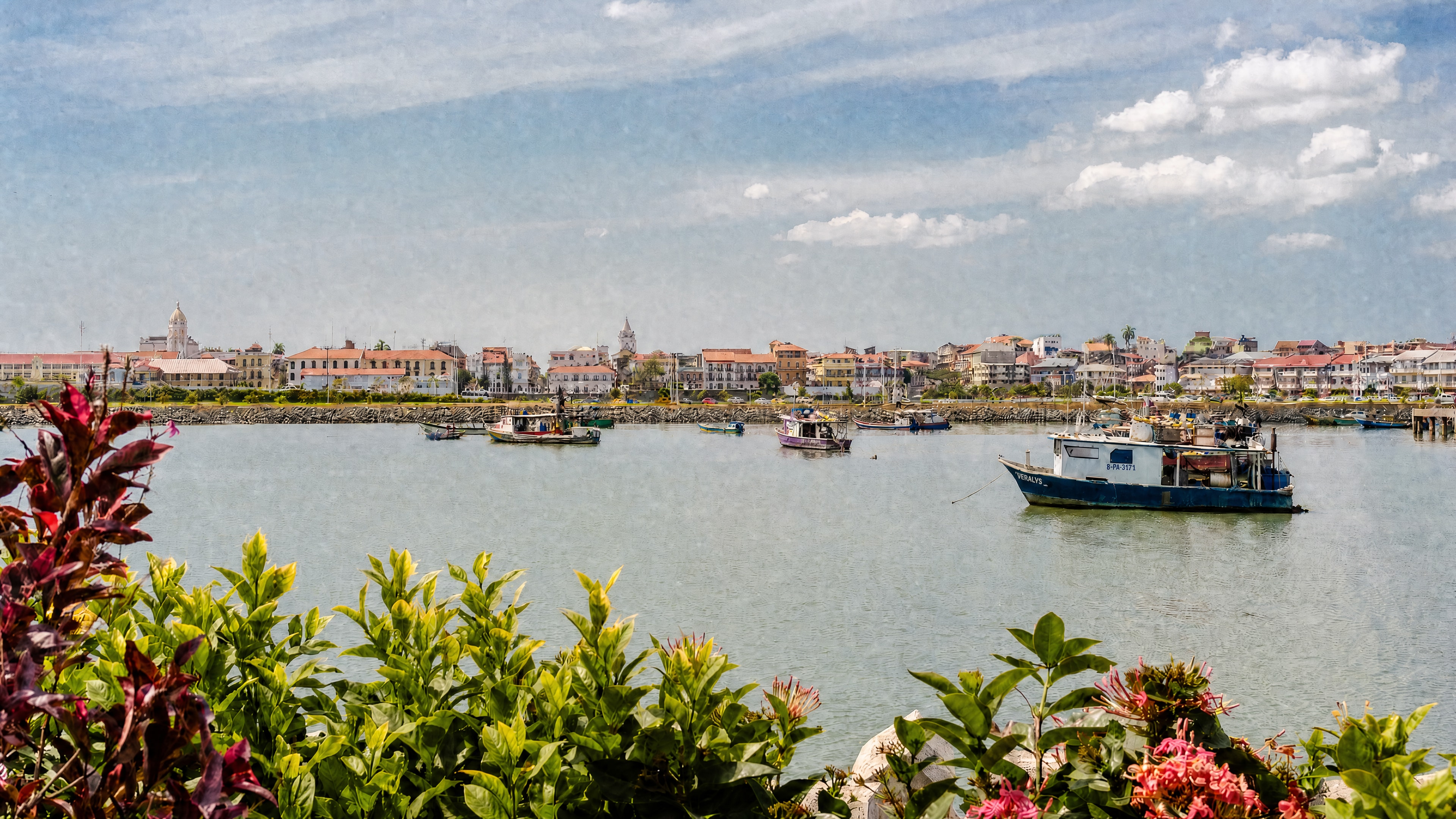 Historic buildings and boats along the Casco Viejo waterfront in Panama City.